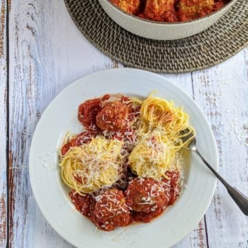 bowl of spaghetti with turkey meatballs and fork