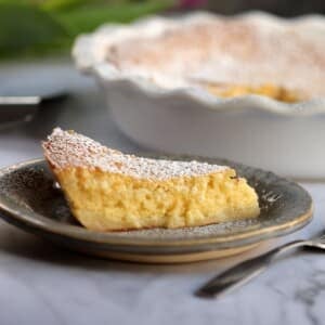 Slice of Lemon Impossible Pie on plate.