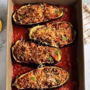 Stuffed eggplant in a baking dish.