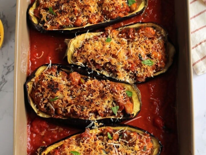 Stuffed eggplant in a baking dish.