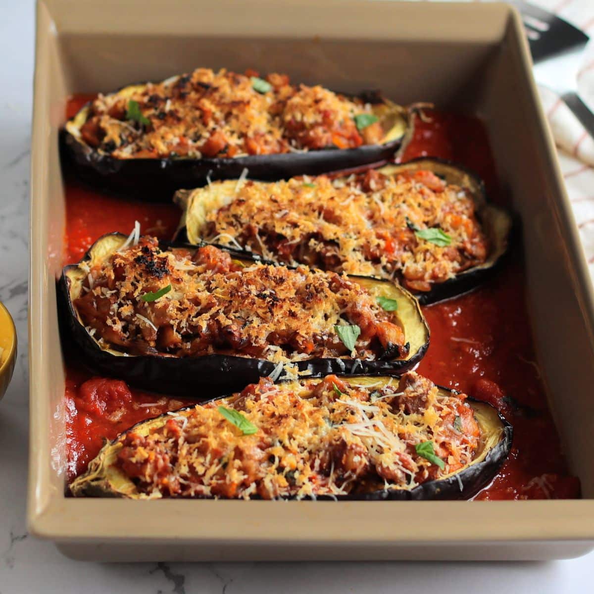 Baked Stuffed Eggplant in baking dish.