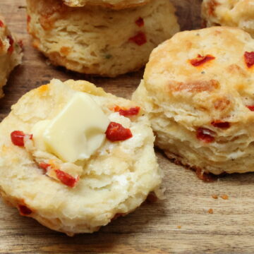 split open Pimento Cheese Buttermiilk Biscuits with butter