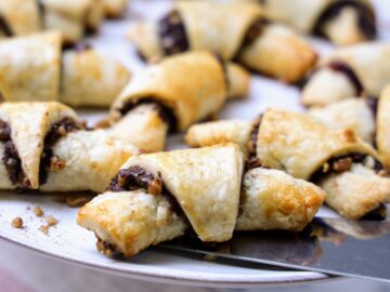 Close up of chocolate rugelach on serving platter