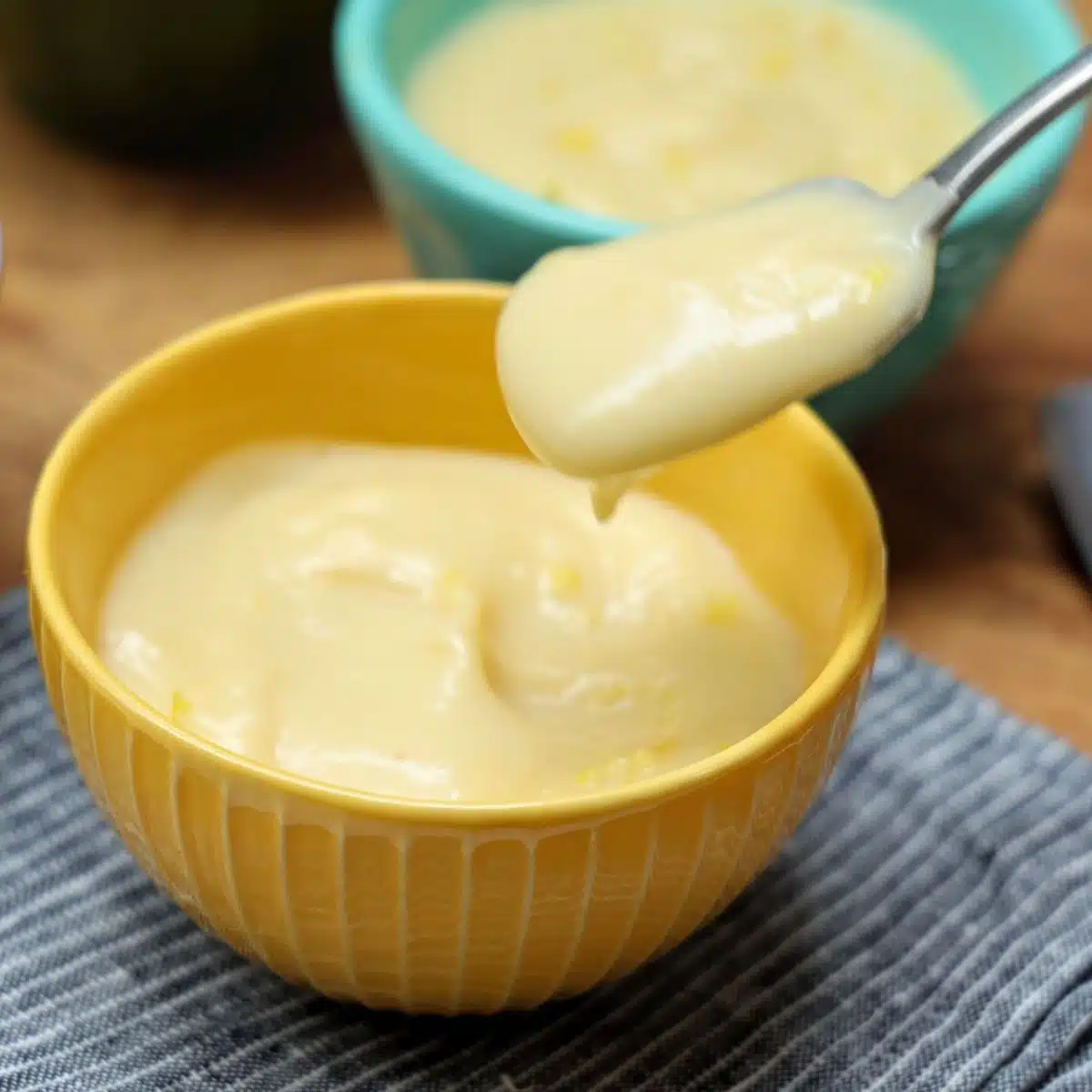 lemon pudding with spoonful.