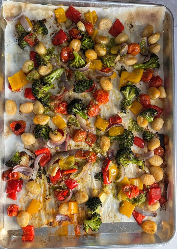 overhead shot of the roasted gnocchi and vegetables on a sheet pan