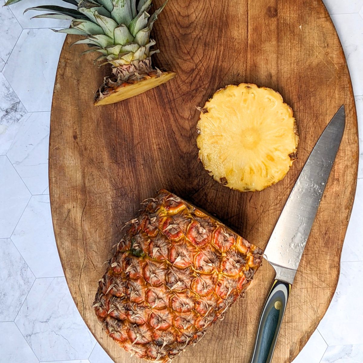 Step one for cutting pineapple.