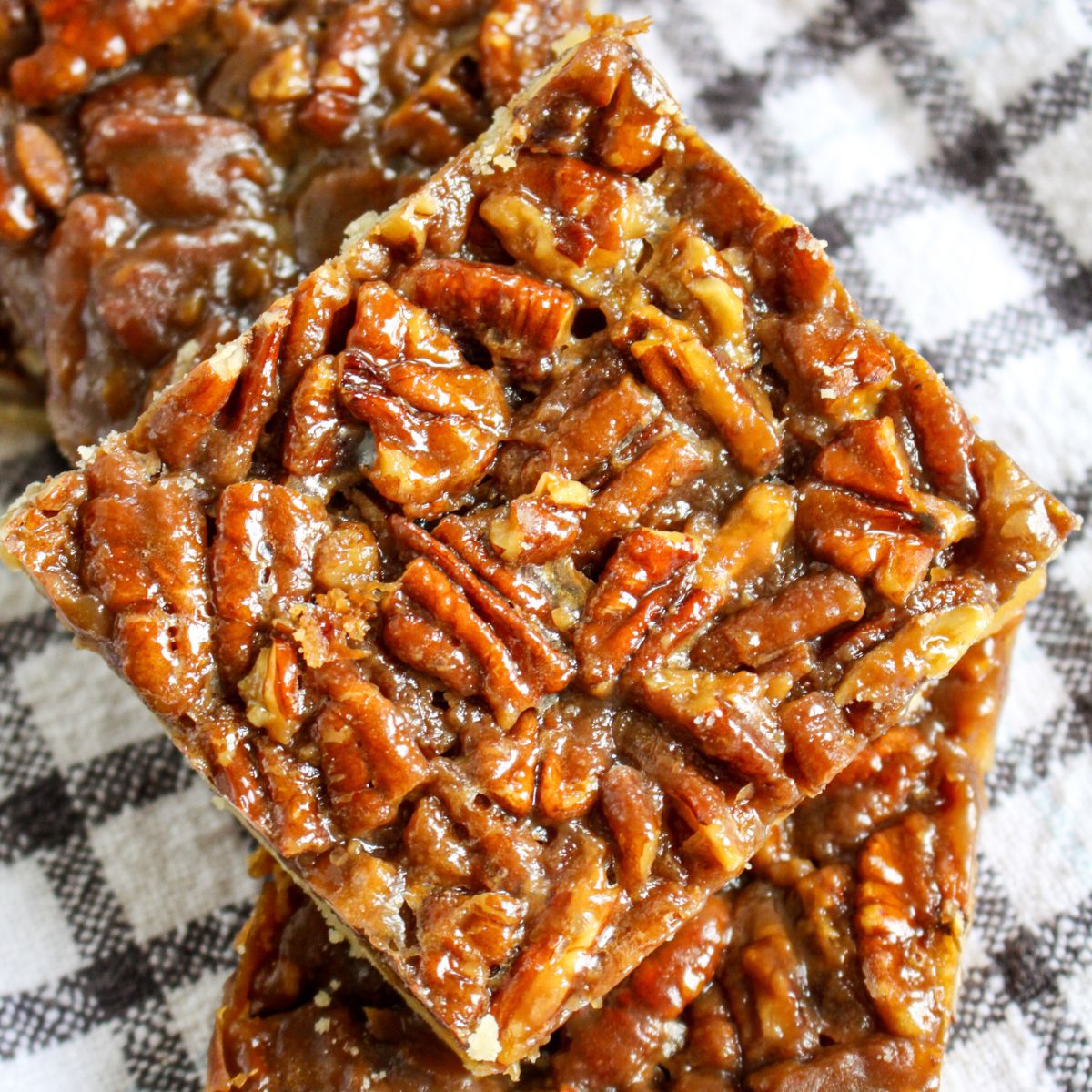 Stack of Pecan Pie Bars.