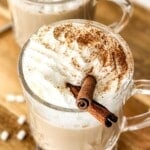 Eggnog latte in glass mug.