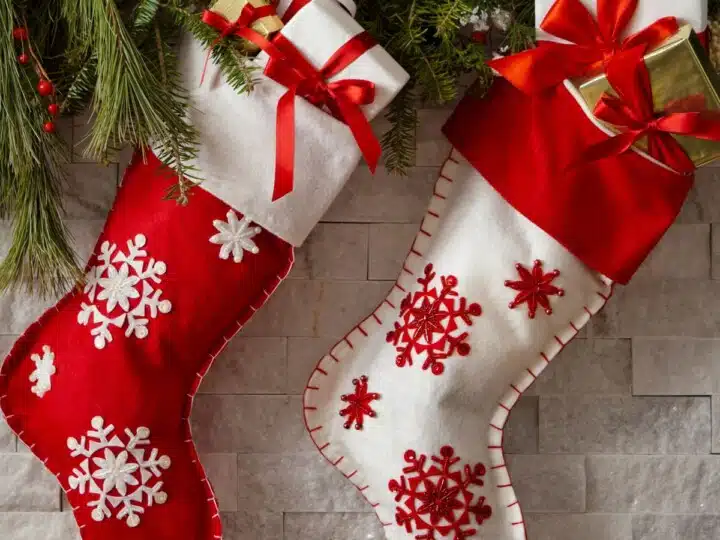 Christmas stockings hangin on mantel.