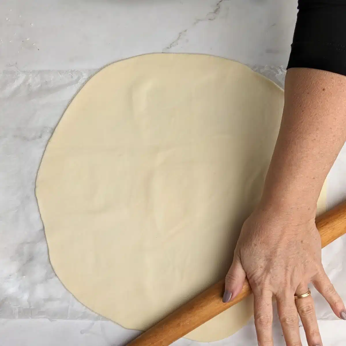 rolling dough for mushroom tart.