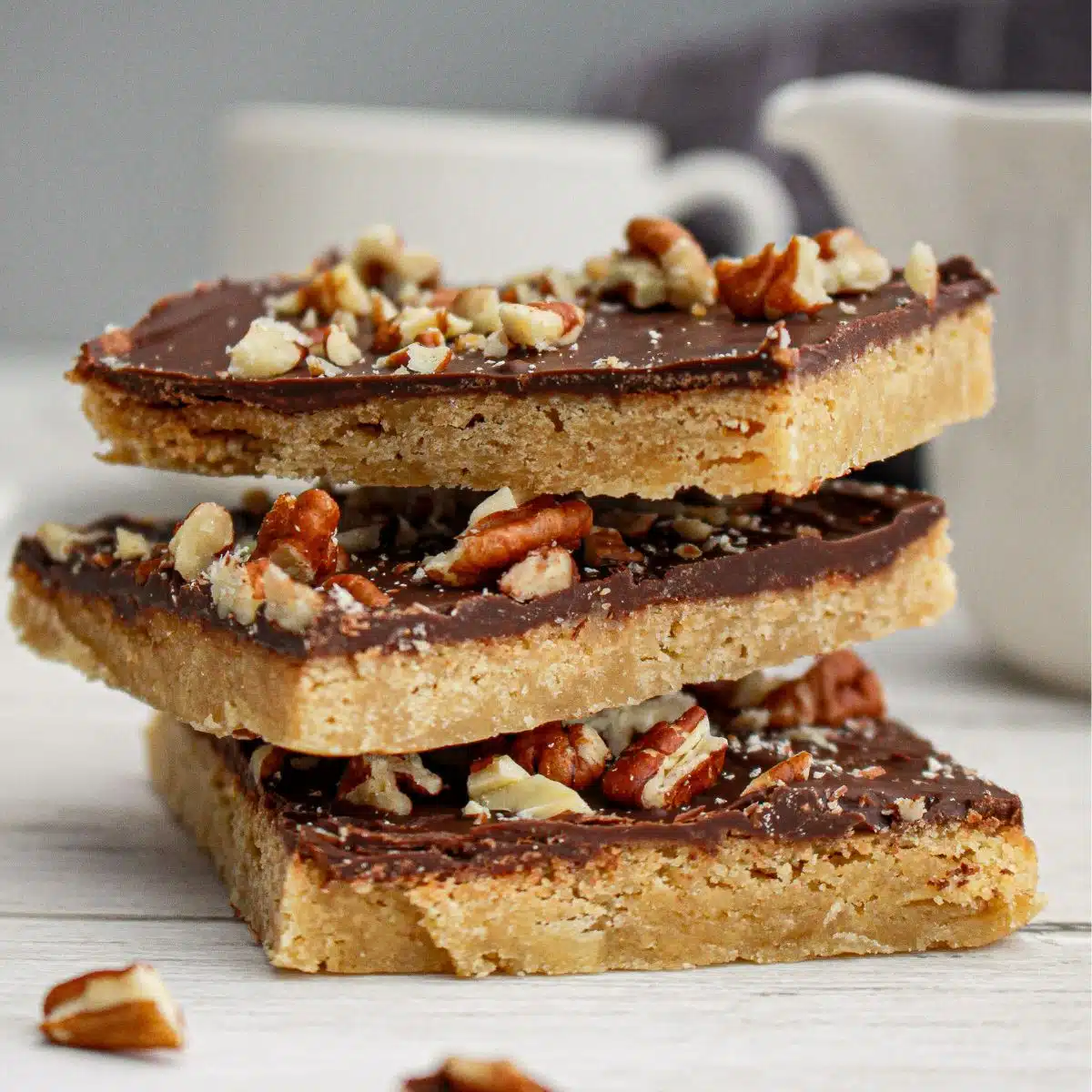 Stack of the chocolate toffee squares. 
