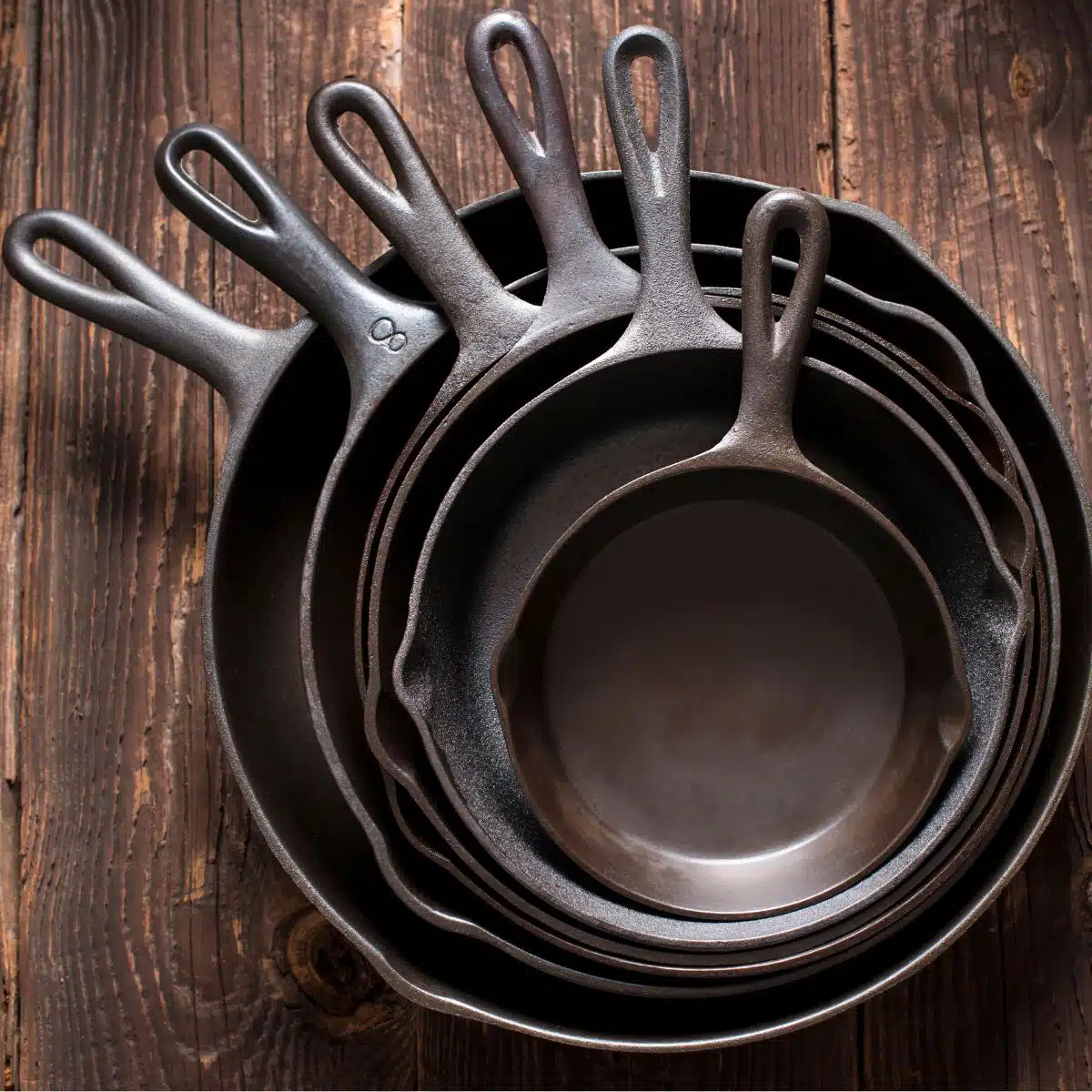 Stack of cast iron skillets. 