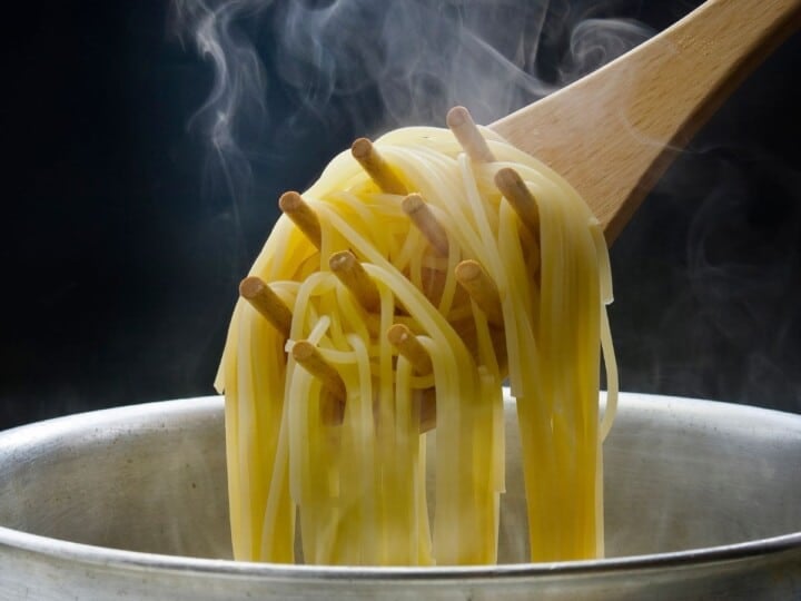 Pasta cooking in a large pot.