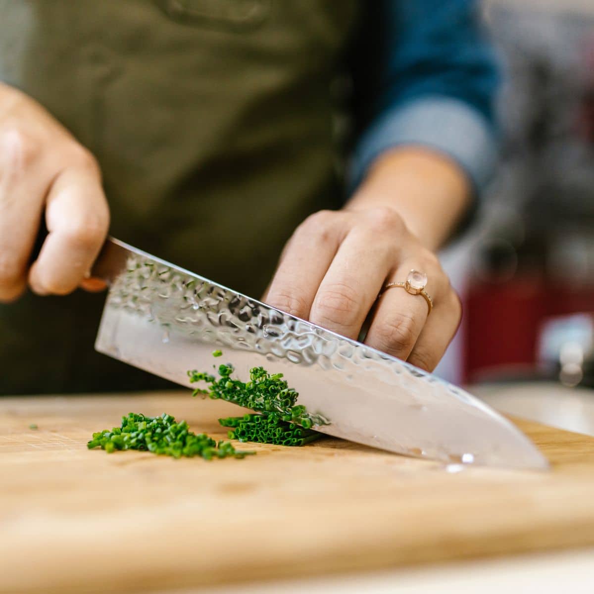 Chopping herbs with a Japanese chef's knife.