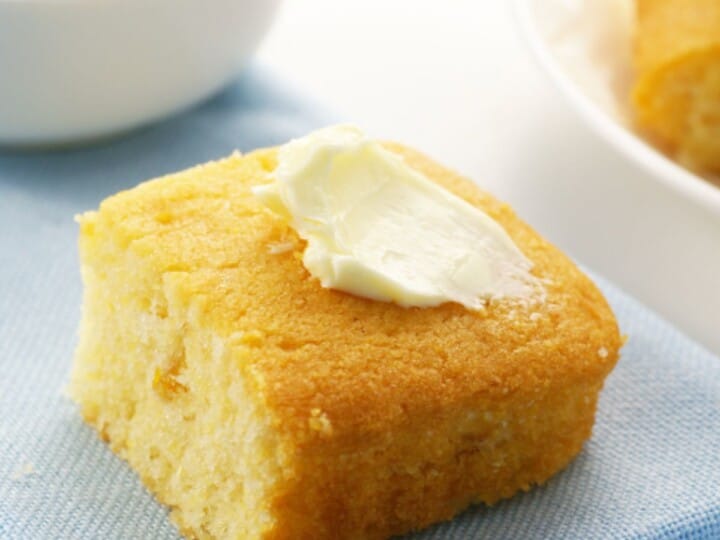 Slice of cornbread with butter.