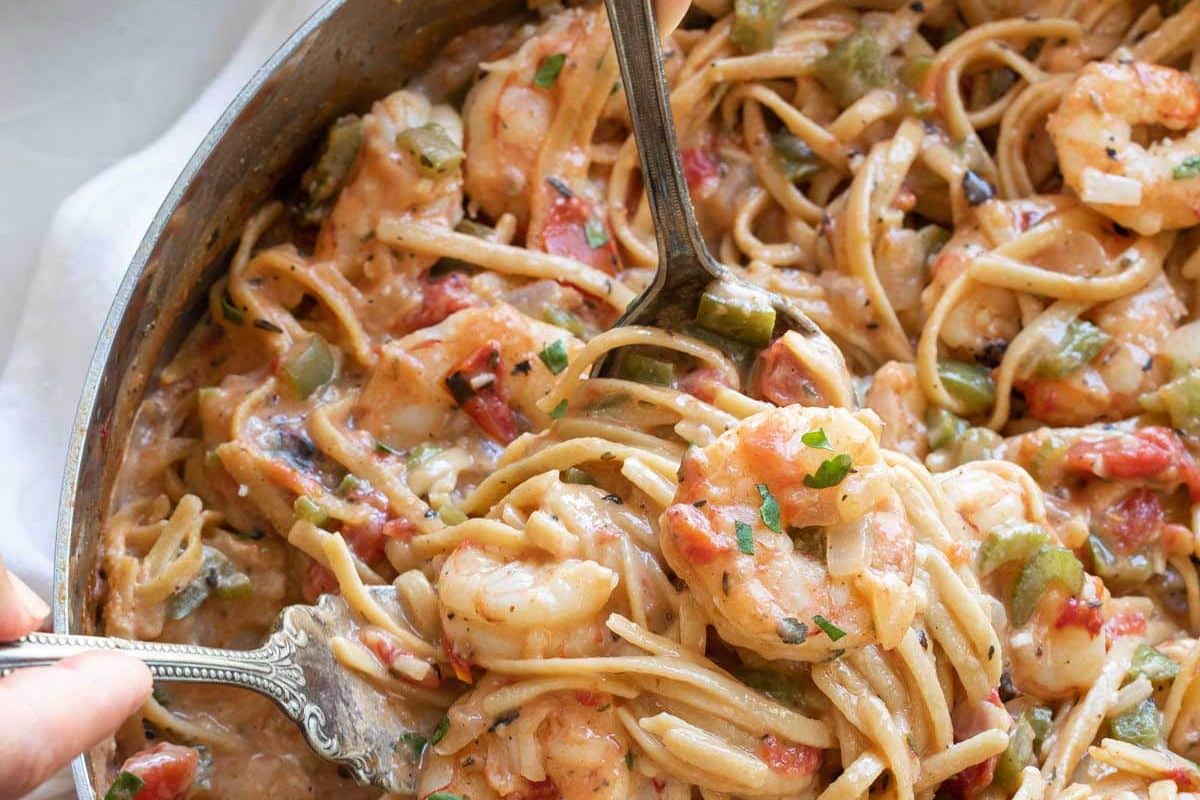 One pot creamy cajun pasta with shrimp in pan.